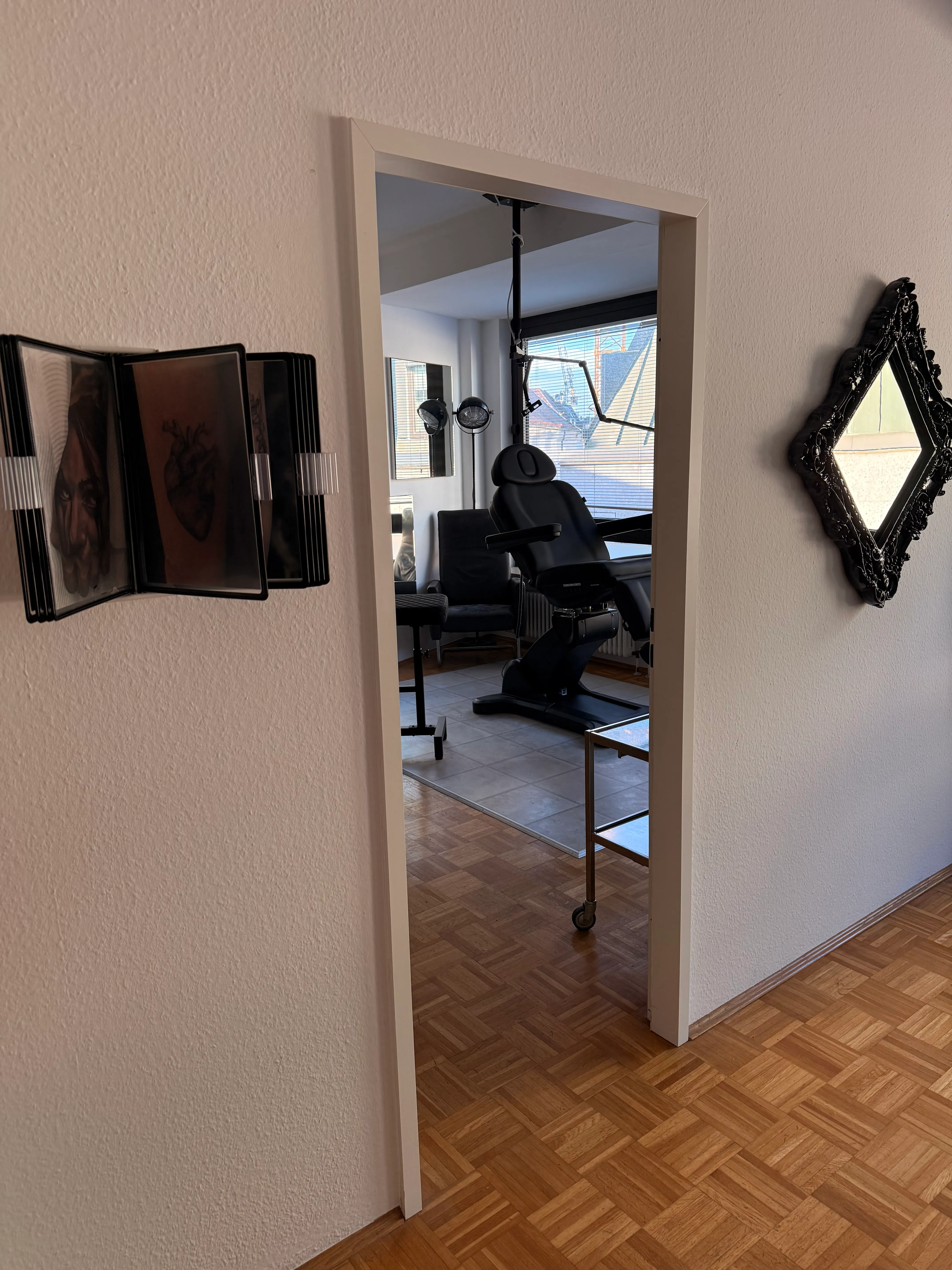 Entrance to the private VIP area, away from the main studio, with artwork on the door